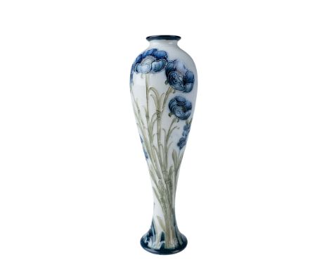 A stunning Moorcroft Macintyre Florian Ware vase designed by William Moorcroft, featuring the iconic Poppy pattern. This piec