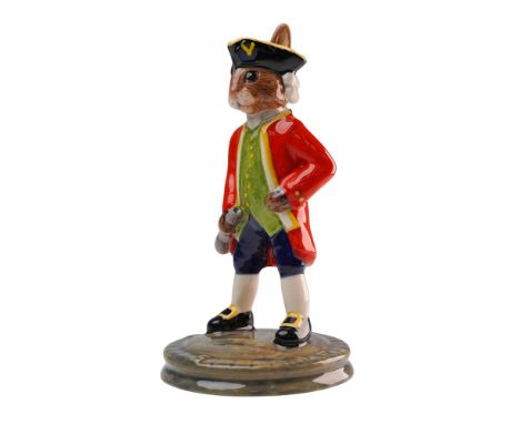 Prototype figure depicting the famous explorer in a bold red coat, pale green waistcoat with yellow buttons and dark blue bri