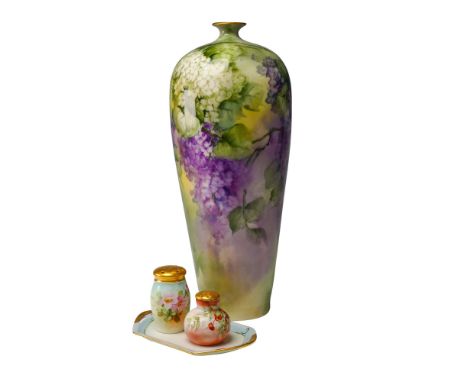 This 4-piece lot features a striking mix of hand-painted porcelain pieces, highlighted by a tall French Limoges vase decorate