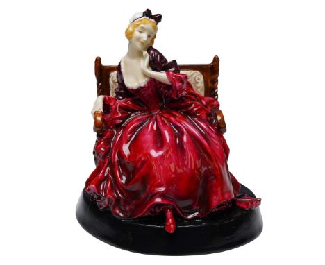 This Royal Doulton porcelain figurine titled Proposal (HN715) features a seated lady in a sumptuous burgundy and black gown w