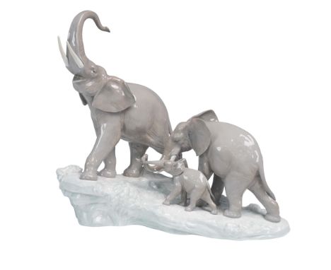 A majestic Lladro porcelain figurine titled Elephants, item number 01001150, portraying a powerful family group of three elep