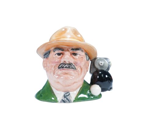 Royal Doulton small character jug titled The Bowls Player, model D6896. This example is a prototype colorway, differing from 