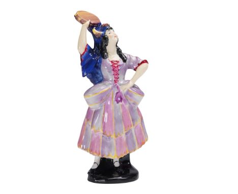 Hand-painted and potted by Doulton &amp; Co., this early Royal Doulton porcelain figurine portrays Elsie Maynard, a character
