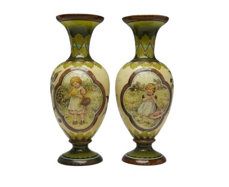 Pair of Doulton Lambeth vases hand decorated by artist Ada Dennis. Each vase features alternating panels depicting floral mot