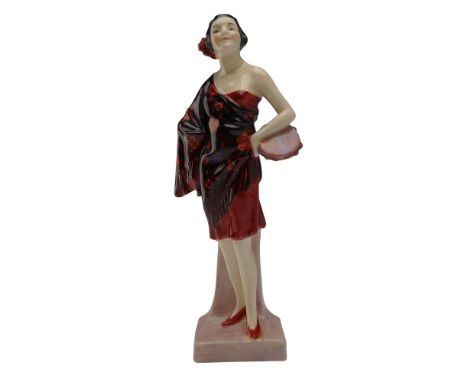 This striking Royal Doulton porcelain figurine, titled Carmen (HN1267), was designed by renowned artist Leslie Harradine and 