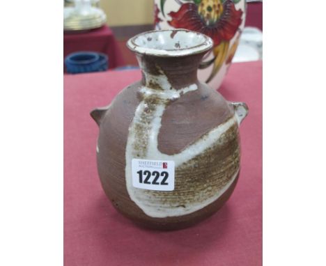 Janet Leach (1918-1997); A Stoneware Pottery Vase, with flared neck and lugs to the shoulders, grey glazed trail design to br