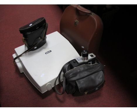Good Companion 4 and Erika Electric (W.S.F.P.O.) Typewriters; Tecnar 8 x 40 binoculars, colour zoom 8 camera.