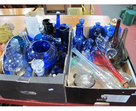 An Assortment of Blue Glassware, including oil lamp, decanters, vases etc:- Two Boxes