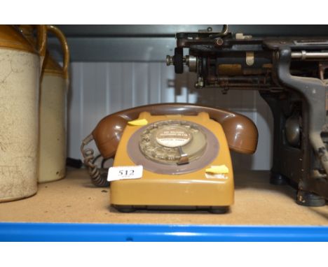 A rotary dial telephone 