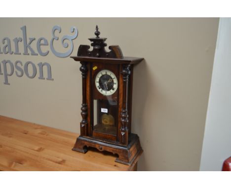 A late 19th Century two hole mantel clock 