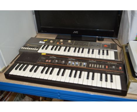 Two Casio keyboards lacking leads