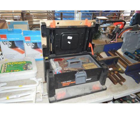 A Black &amp; Decker workmate tool box and contents