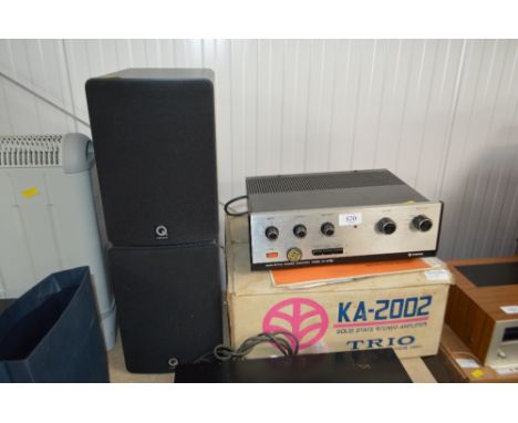 A Trio stereo amplifier, with original box; together with a pair of acoustic speakers