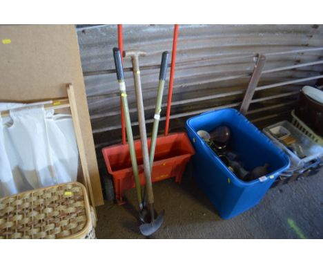 Two long handled gardening tools; and a seed spreader