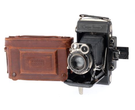 A Zeiss Ikon Super Ikonta 530/2 Folding Camera, black, body G, opens and folds correctly, 6x9 camera but has a 6x4.5 mask ins