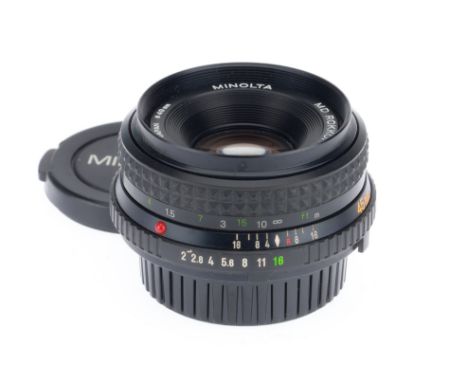 A Minolta MD Rokkor f/2 45mm Pancake Lens, black, serial number 1492110, body VG, optics VG, light haze, with front &amp; rea