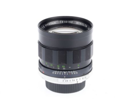 A Minolta MC Tele-Rokkor f/2 100mm Lens, black, serial number 1310150, barrel VG, light paint wear, optics VG, with rear cap.