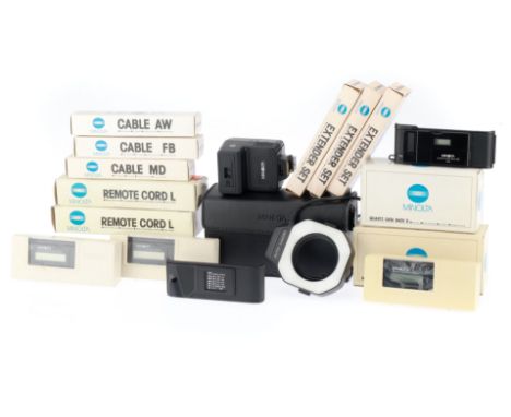 A Selection of Minolta Camera Accessories, to include 5off Multi-function and data backs, remote control cords, an 80PX Ring 