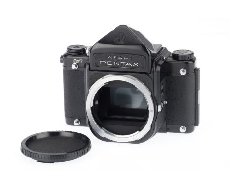 A Pentax 6x7 Medium Format SLR Camera Body, black, serial number 4021996, body VG, shutter works at all speeds, light usage s