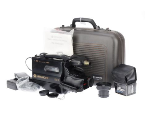 A Hitachi VM-2300E VHS Video Camera Outfit, black, body G, viewfinder opens and extends properly, with charger and battery, c