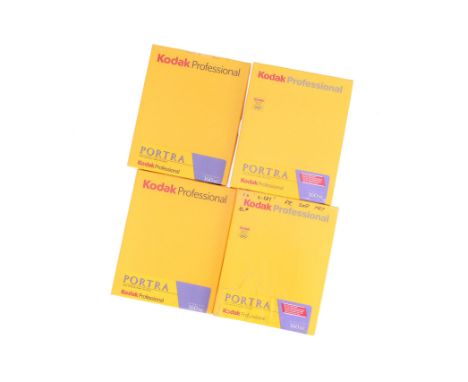 A Quantity of Kodak Portra 160 Expired 4x5 Film, comprising two packs of 10 sheets, expiry 03/2011, and two packs of 50 sheet