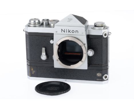 A Nikon F 35mm Camera Body with Motor Drive, silver, serial number 6410198, body G, usage marks to bottom plate, shutter work