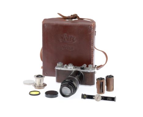 A Leica Standard 35mm Viewfinder Camera Outfit, silver, serial number 207438, 1936, body G, some marking to sides of bottom p