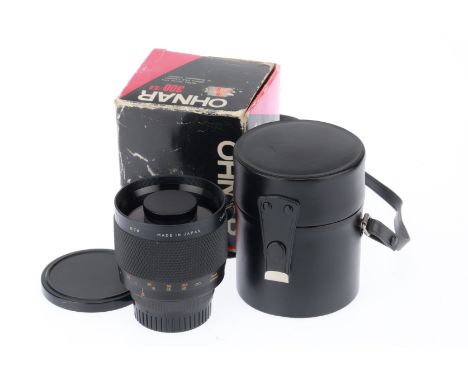 An Ohnar f/5.6 300mm Reflector Lens, black, barrel VG, optics VG, M42 mount with a Minolta MD adapter, in maker's box.