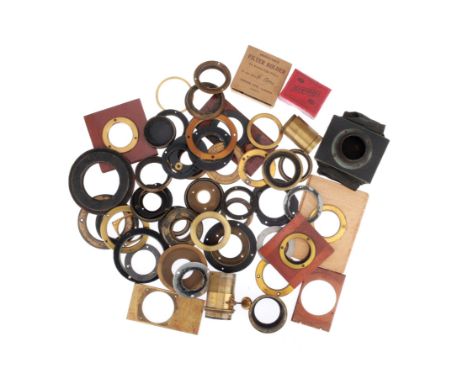 A Selection of Lens Mounting Rings, mostly brass, various sizes, some wooden lens boards, a lens barrel, a lot.