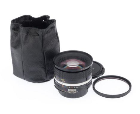 A Nikon Nikkor f/2.8 20mm Ai Wide Angle Lens, black, serial number 203524, barrel VG, optics VG, aperture blades good.