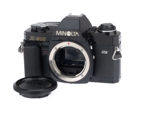 A Minolta X-600 35mm SLR Camera Body, black, serial number 8014356, body VG, with batteries inserted the shutter works on man