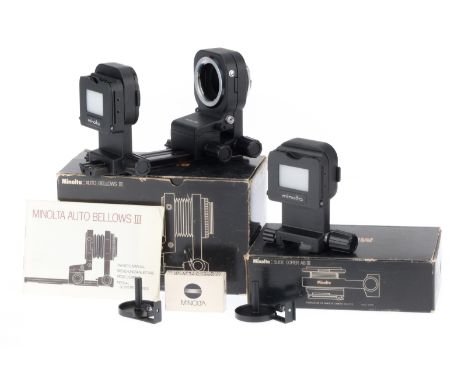 A Group of Minolta Auto Bellows Accessories, comprising an Auto Bellows III, a Slide Copier AB-III, and a Synchrocord AB-III.