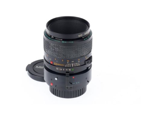 A Minolta MD Macro f/3.5 50mm Lens, black, serial number 8009644, barrel VG, optics VG, with attached 1:2 converter, with cap