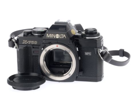 A Minolta X-700 35mm SLR Camera Body, black, serial number 1822775, body G-VG, with batteries inserted the shutter works at a