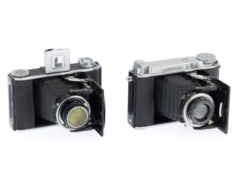 A Pair of Voigtlander Bessa 46 Folding Medium Format Cameras, comprising a Bessa 46, black, body F-G, opens and folds correct