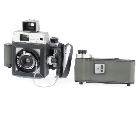 A Mamiya 23 Standard Medium Fomat Press Camera, silver and grey, body G, some usage marks to front panel, with additional han