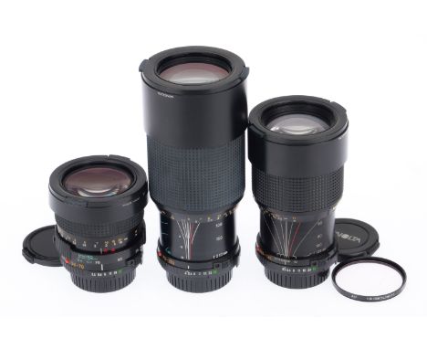 A Group of Minolta Constant Aperture Zoom Lenses, comprising a MD f/3.5 35-70mm, a MD f/3.5 50-135mm, and a MD f/4 70-210mm, 