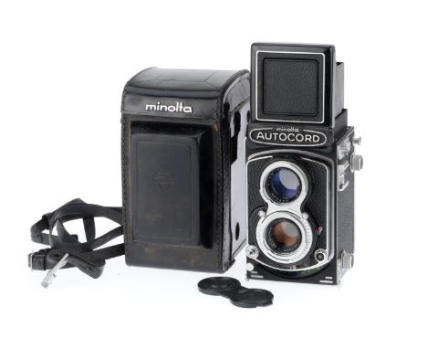 A Minolta Autocord, TLR Camera, serial number 422429, with Minolta Rokkor f/3.5 75mm lens, body G, shutter working, lenses G,