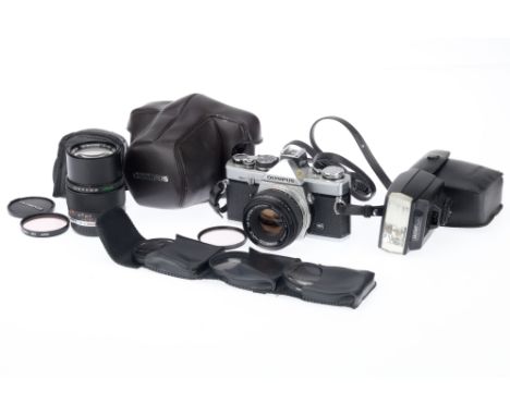 An Olympus OM-2 MD Camera Outfit, to include an OM-2 MD, body F-G, usage marks to base, shutter works, meter responds, with a