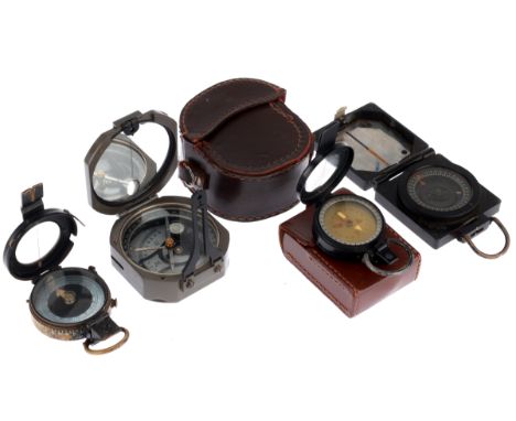 A Collection of 4 Marching Compass' including an unmarked compas finished in green enamel in a leather case, another in a cas