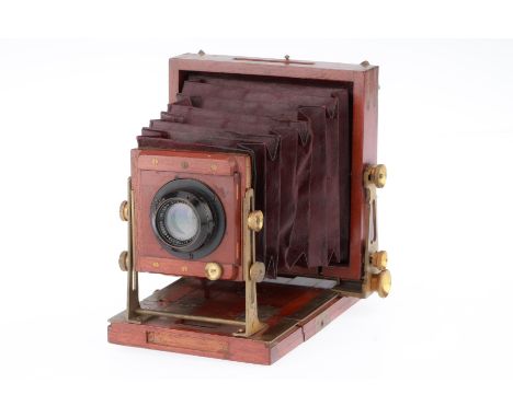 A Lancaster Instantagraph Camera, mahogany and brass, body F, bellows open and close but have some creasing, focussing screen