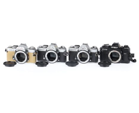 A Group of Minolta X Series 35mm Camera Bodies, comprising X-700, black, serial number 2552349, body VG, shutter works, speed