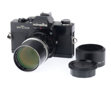 A Minolta SRT202 35mm SLR Camera, black, serial number 2303765, body VG, shutter working, not battery tested, with a MC Tele-