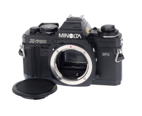 A Minolta X-700 35mm SLR Camera Body, black, serial number 2558066, body VG, with batteries inserted the shutter works at all