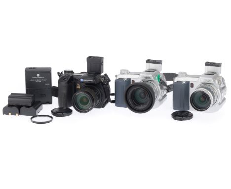 A Group of Minolta Dimage Cameras, comprising an A2, black, body VG, powers up, takes a picture, with charger and batteries, 