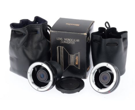 A Pair of Minolta Monocular Converters, black, VG, in soft cases, one in maker's box.