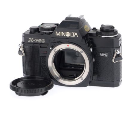 A Minolta X-700 35mm SLR Camera Body, black, serial number 1499267, body VG, with batteries inserted it is not powering up, n