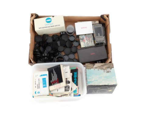 A Selection of Empty Packaging, Literature, and Lens Caps to include empty packaging, and a quantity of Minolta body and lens