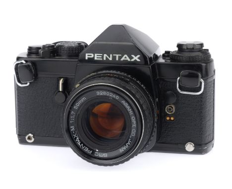 A Pentax LX 35mm SLR Camera, black, serial number 5315273, body G minor usage marks to prism cover and bottom plate, shutter 