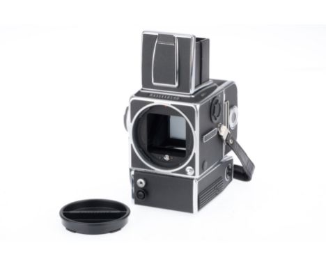 A Hasselblad 553ELX Medium Format Camera Body, black, serial number RT1331705, body VG, untested,, with film back and cap.